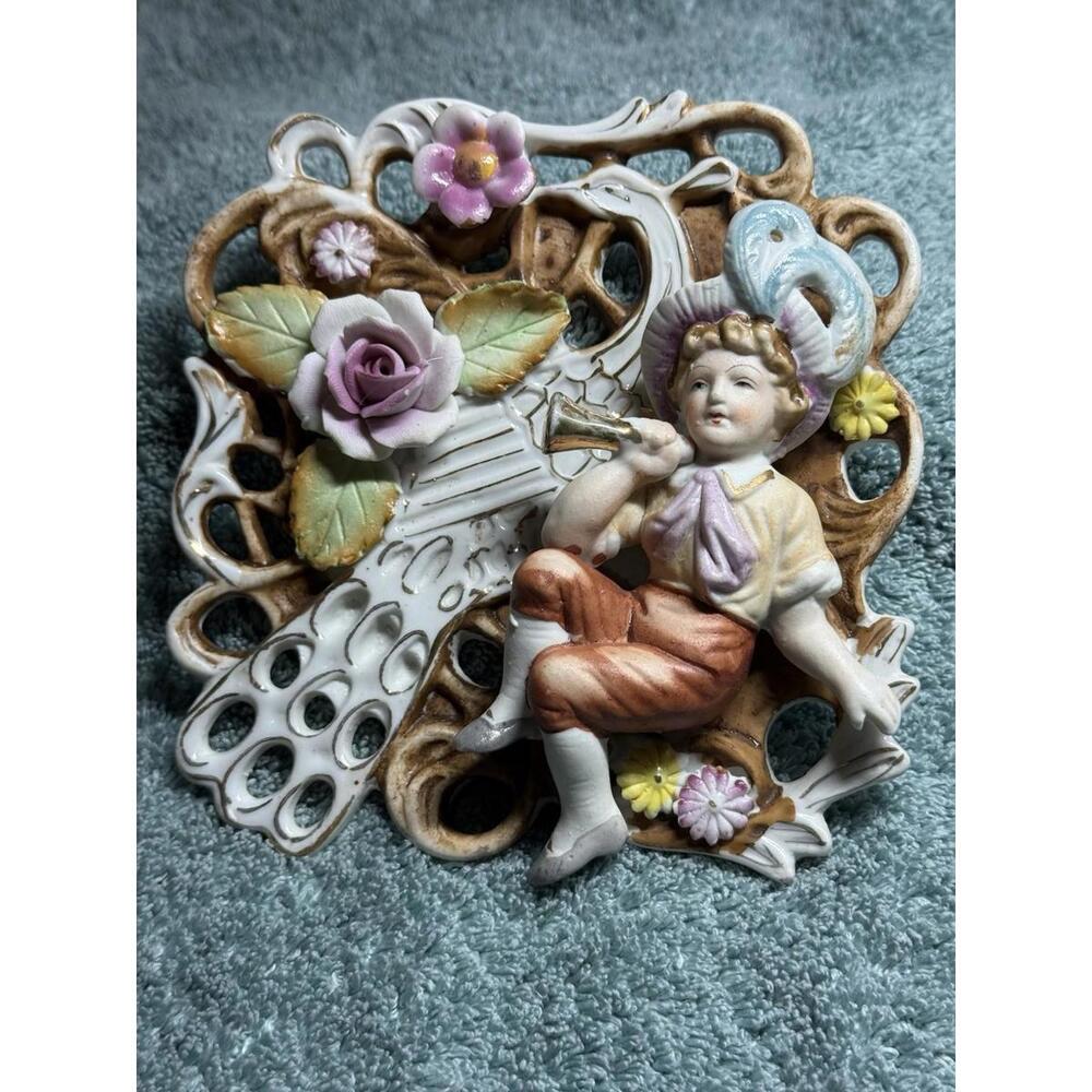 Vintage Porcelain Wall Plaque With Cherub And Floral Design